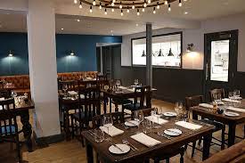 With 10 bedrooms and 8 wet rooms, ashbourne hall has the capacity to sleep up to 21 delegates in separate beds. The Dining Room And View Into The Kitchen Picture Of The Greenman Public House Ashbourne Tripadvisor