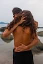 File:Woman and man embracing on the beach by Dainis Graveris on ...