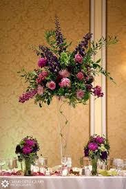 Innogear artificial flowers, 50 pcs faux flowers fake flowers ivory roses perfect for diy wedding bouquets centerpieces bridal shower party home flower arrangement decorations $18.99 ($0.38/count) in stock. Purple Centerpieces Tall Wedding Centerpieces Flower Centerpieces Wedding Wedding Table Flowers