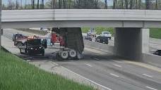 Video shows moment truck hauling gravel slams into overpass on I ...