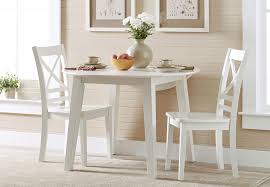 Sofia vergara santa fiora white 5 pc round dining room. Jofran Simplicity White Round Drop Leaf Dining Table With Two X Back Side Chairs