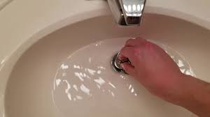 Let the solution effervesce in the sink for five to 10. Lifting Stuck Pop Up Sink Drain Plug With Magnet Youtube