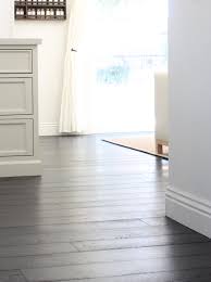 The tricky part is generally if you have red toned or mahogany furniture. White Kitchen With Dark Wood Floors Would We Do It Again