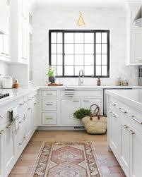 Gray floors what color walls. Like Black Window Trim White Subway Backsplash Door Pulls White Cabinets And Light Count Interior Design Kitchen White Kitchen Design Modern Kitchen Design