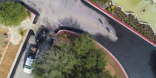 How much to seal a driveway. Reasons To Seal Coat Driveway Or Parking Lot This Fall