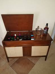 This Mid Century Bar Was Repurposed From A Vintage Ge Record Player Cabinet Available On Ph Record Player Cabinet Vintage Record Player Cabinet Bar Furniture