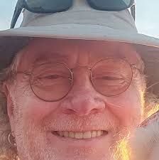 The Five Maya Eccentric Flints, dating to the Late Classic period (A.D.  550-950), showcase intricate craftsmanship in mottled chert. Two of the  flints are stylized representations of God K, adorned with distinctive