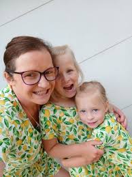 Matching pet and human Christmas sweaters
