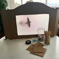 A Diy Shadow Puppet Theatre We Saw A Puppet Show Earlier In The Week And Got Inspired Cardboard Box Baking Paper Sk Shadow Puppets Shadow Theatre Shadow