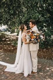 If you're going for a solid pink dress, i love the idea of doing a gold chandelier. Intimate And Colorful Soho South Cafe Wedding Junebug Weddings