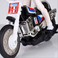 The models included a robbie knievel doll, the scramble van, a dragster, a stunt car and the evel knievel the stunt world. 1970s Evel Knievel Stunt Cycle Toy Reissued Retro To Go