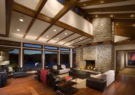 Vaulted Ceilings Make A Room Brighter And Airier But They Waste Energy And Are Drafty In W Vaulted Ceiling Lighting Rustic Ceiling Vaulted Ceiling Living Room