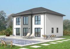 beliebt bei unseren kunden modernes massivhaus mit walmdach mehr informationen uber herwig haus und unsere mass fassade haus haus architektur haus ideen