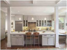 The kitchen island with a light patterned white quartz countertop looks like a big table and adds functionality. 10 Kitchen Island Post Ideas 2021 Standing Sturdy