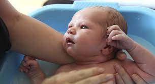 Take a small tub and fill it with warm water. Bathing Your Newborn Babycenter India