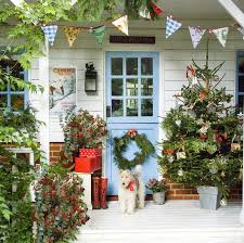 Outdoor christmas porch railing decorations. 23 Best Christmas Porch Decorations 2020 Outdoor Christmas Decor For The Porch