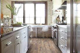 When considering flooring for the kitchen, laminate is a popular choice for those who want an aesthetic upgrade from vinyl sheet flooring but have a limited budget for the project. How To Clean Laminate Floors 11 Do S And Don Ts Architectural Digest
