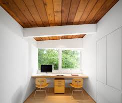 Push two desks together and fitout a double filing cabinet system. 15 Home Offices Designed For Two People