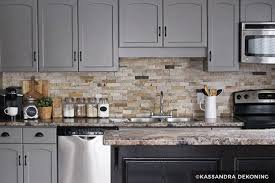 The gloss gray tile would make an elegant accent to best part? Painting Kitchen Cabinets Before After