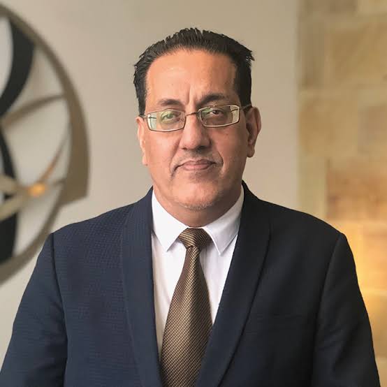 Nazir Afzal Hopwood Hall College chair profile