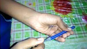 Take the drill and position it on the middle of the bottle cap, then drill a hole in it. How To Make A Simple Water Gun Using Pen Youtube