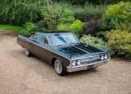 Olds in 1897, olds introduced the assembly line as a vehicle assembly method; 1964 Oldsmobile 98 Classic Driver Market