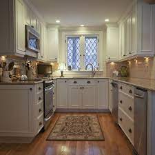 Pictures of popular kitchen designs, paint colors, cabinet layouts and decorating ideas. Traditional Kitchen Photos Small U Shaped Kitchen Design Ideas Pictures Remodel And Decor Kitchen Remodel Design Kitchen Design Small Kitchen Remodel Small