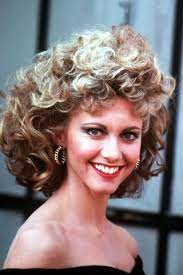 11 Iconic Perm Moments Grease Hairstyles Olivia Newton John Sandy Grease