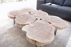 Mit einem couchtisch aus einem baumstamm und dem dazu passenden esstisch aus einem baumstamm können sie ihre wohnlandschaft vollkommen neu gestalten. Grosser Beistelltisch Akazie Riess Ambiente De