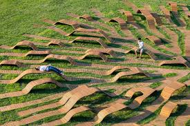 A System Of Root Like Benches Spreads Organically Through A South Korean Public Park Parking Design Public Sculpture Landscape Architecture Design