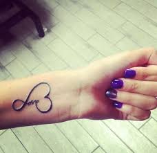 35 Inspiring Love Tattoo Ideas Cuded Cute Girl Tattoos Cute Small Tattoos Word Tattoos