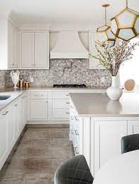 (pic is my utility not main kitchen as don't seem to have one of that on my phone but. Beautiful Off White Kitchen Boasts An Off White Island Accented With Satin Nickel Pulls And A Taupe Quar Taupe Kitchen Off White Kitchens Kitchen Remodel Small