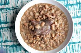 Want a big bowl of navy beans with a side of cornbread? Pinto Beans With Ham Hocks Recipe The Hungry Hutch