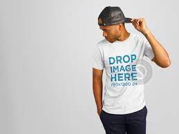 New T Shirt Mockup Of A Young Black Man Wearing A Hat Try It Here Http Tinyurl Com Zmksdvf T Shirt Shirt Mockup Clothing Mockup
