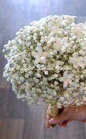 Baby S Breath With Stephanotis Wedding Bouquet Designed By Atelier Lukas Fleuriste Flower Bouquet Wedding White Rose Wedding Bouquet Simple Wedding Bouquets