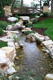 A backyard stream can transform any boring backyard into a majestic nature filled playground. 20 Outstanding Natural Garden Stream Designs That Will Amaze You Feelitcool Com Water Features In The Garden Garden Stream Ponds Backyard