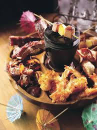Epic Rap Battles Of History Bruce Lee Vs Clint Eastwood This Pupu Platter A Mashup Of Japanese And Cantonese Cuisine Is A Nod To The Food Made Popular Polynesia Coconut Shrimp Recipes Pu Pu Platter Coconut Recipes
