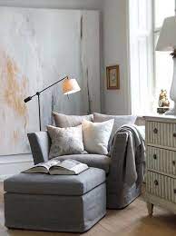 Altra soluzione è quella di una poltrona dallo stile classico e raffinato, che si faccia notare sia per il suo design che per i materiali con cui è realizzata. Blue Grey Chair And Ottoman Reading Nook Scandinavian Style Understated Via Ointerest On Arredamento Sala Piccola Salotti Minimalisti Arredamento Salotto Idee