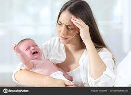 Desperate Mother And Her Baby Crying Stock Photo By ©Antonioguillemf  161852462