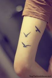 Three Birds On A Wire Tattoo Three Birds Arm Tat Tattoo Idea Top Tattoo Ideas Bird Tattoos Arm Small Tattoos For Guys Tattoos For Guys