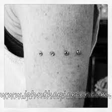 Dermal Arm Band Piercing Tattoo Dermal Piercing Tattoos