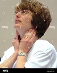 Peggy Cohen, daughter of deceased Sago Mine worker Fred Ware, expresses her  frustration after asking a question of the International Coal Group panel  during the second day of the Sago Mine disaster