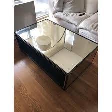A sleek and modern grey coffee table. Restoration Hardware Strand Mirrored Coffee Table Aptdeco