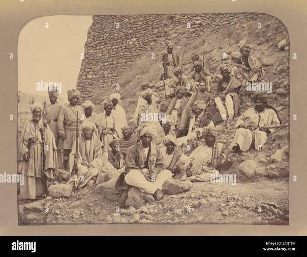 Khyber Chiefs and Khans with Captain Tucker, Political officer in Jamrood Fort. John Burke (Irish, about 1843 - 1900 Stock Photo - Alamy