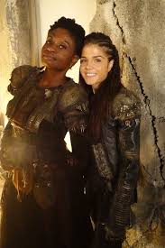 Adina Porter And Marie Avgeropoulos The 100 Cast Behind The Scenes Indra The 100 Show The 100 The 100 Clexa