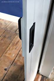 The best and quickest method toward installing a sliding barn door is to purchase a commercially available mounting kit. Basic Farmhouse Style Barn Door Jaime Costiglio