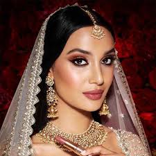 The bengali bridal makeup with bold kohl eyes is very distinctive from south indian elegant classy makeup. Mesmerising Indian Wedding Look Bridal Makeup Look Kit Charlotte Tilbury