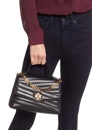 The essence of elegance, the kira top handle satchel, lends polished sophistication to every occasion. Tory Burch Tory Burch Kira Chevron Quilted Leather Top Handle Satchel Handbags