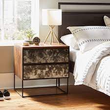 The most common bedside table height is up to the mattress and not much taller. 10 Bedside Drawer Essentials For A Better Night S Sleep Nightstand Essentials