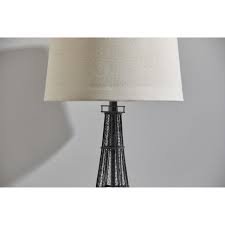 It has got acrylic finish. Eiffel Tower Table Lamp Adesso